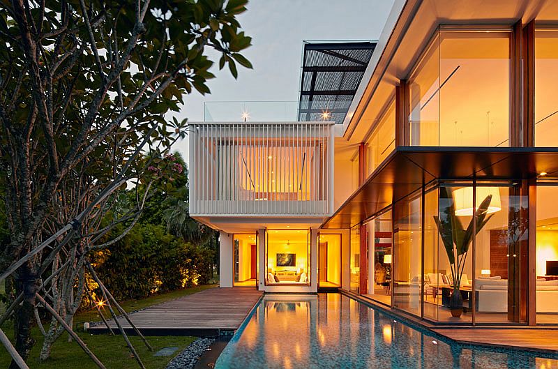 Interior of the No 2 home in Singapore flows into the ponds and pool area outside