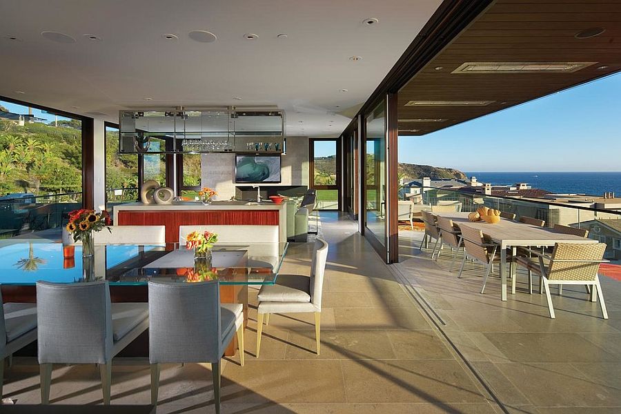 Kitchen that opens up to the deck with ocean view becomes the heart of the social zone