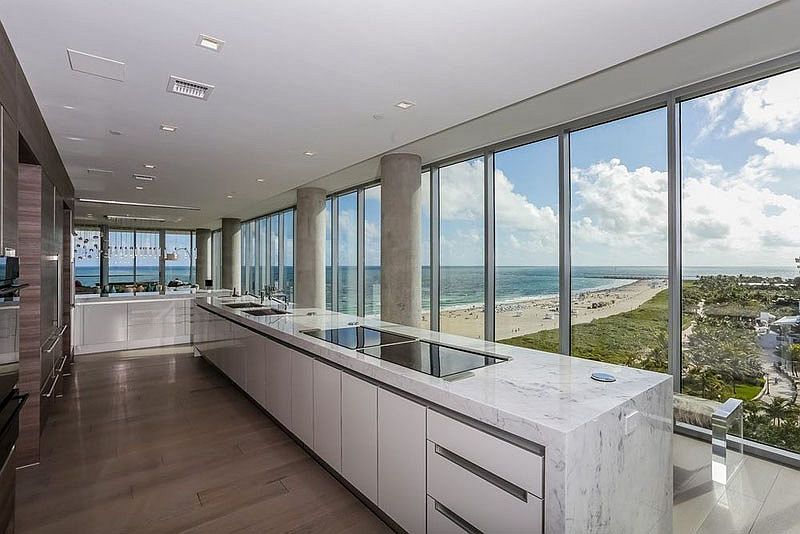 Large kitchen island and workstation make smart use of space