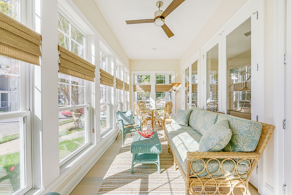 Large porch with windows turned into an elegant sunroom [Design: Echelon Interiors]