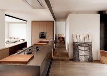 Long-kitchen-island-design-for-the-revamped-apartment-in-Italy-217x155