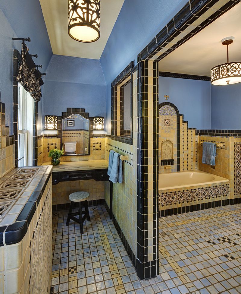 Mediterranean style bathroom with ornate design and a splah of blue