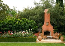 Mediterranean-style-patio-with-a-striking-fireplace-that-matches-its-style-217x155