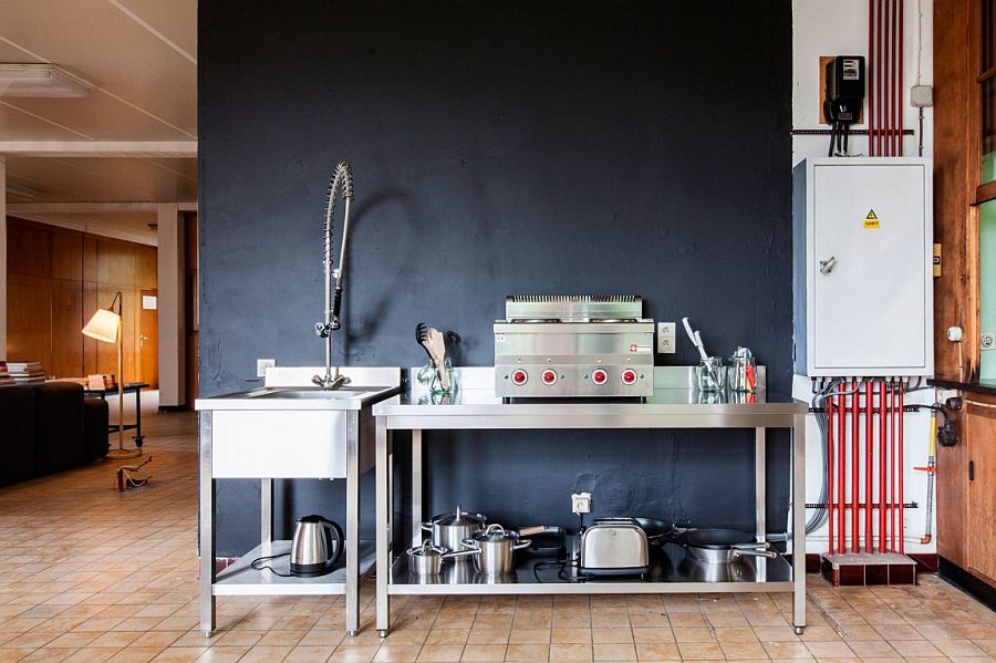 Metal kitchen sink and workstation with an unassuming industrial style