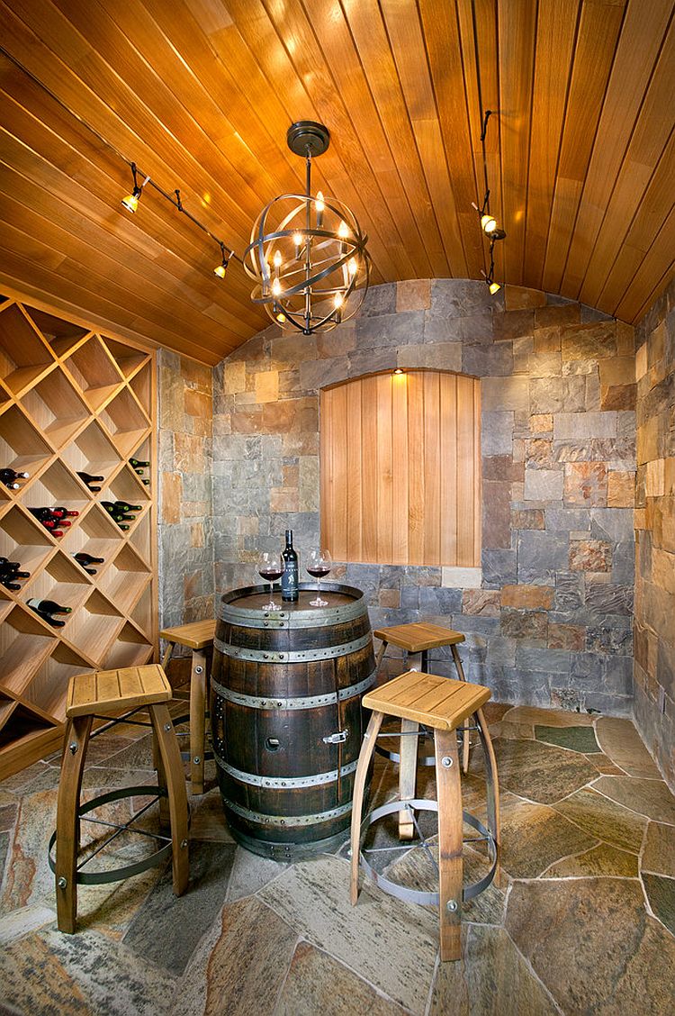 Minimal wine rack for the tasting room with wine barrel table and recycled stools