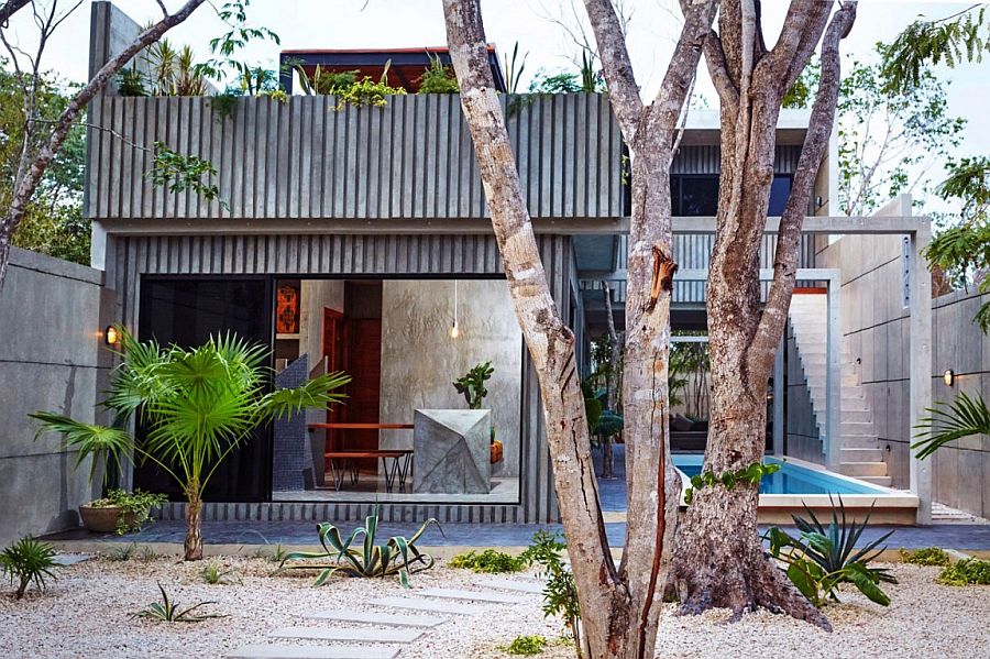 Modern Casa T in Tulum, Mexico surrounded tropical greenery