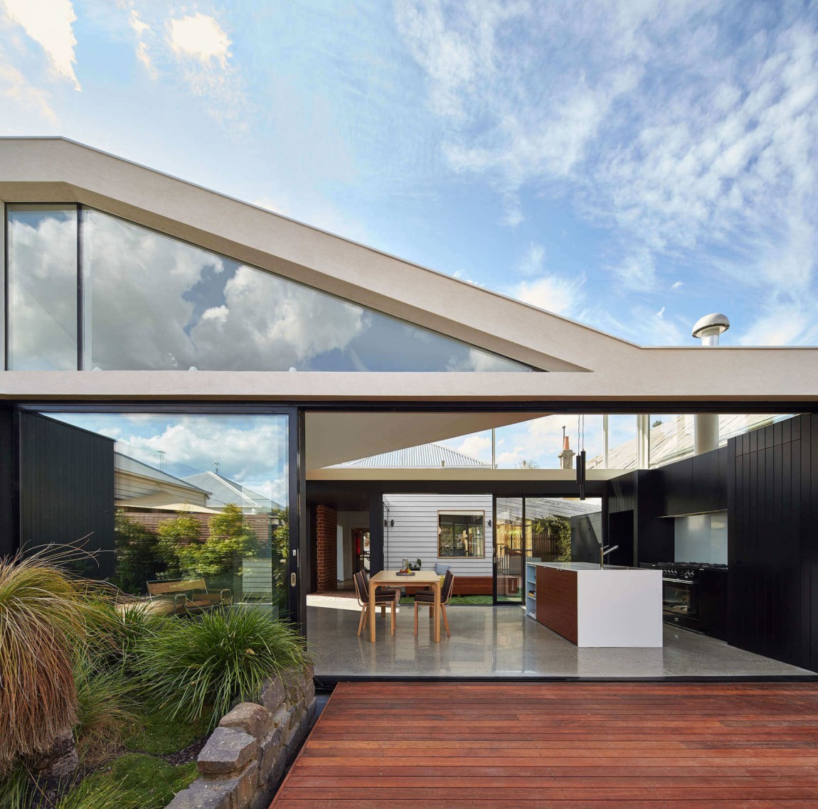 Modern addition adds a cool courtyard and stylish living space to Aussie home