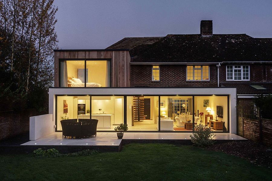 Modern extension stands out in contrast to classic brick facade