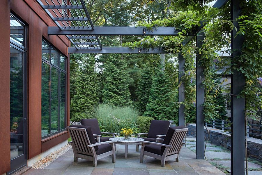 Modern extension to the existong Georgian home comes with a steel pergola structure