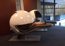woman in nap pod at University of Queensland library