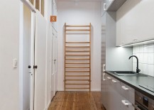 Original-gymnastic-ladder-from-the-revamped-30s-apartment-is-left-intact-217x155