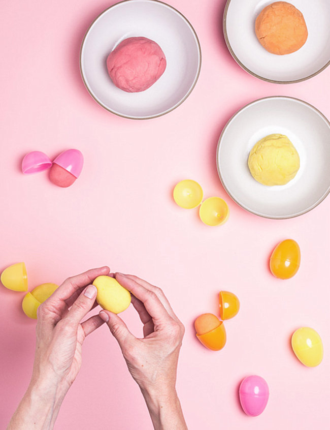 Pastel playdough in Easter eggs from Say Yes