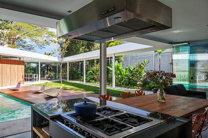 Pavilion-styled kitchen and dining area zone of the contemporary home