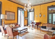 Plastered walls and ornate ceiling create a perfect backdrop for the Victorian living space