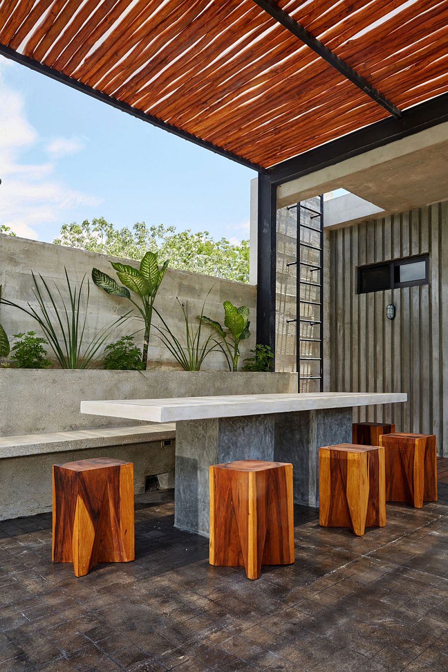 Polished cement and marble alfresco dining