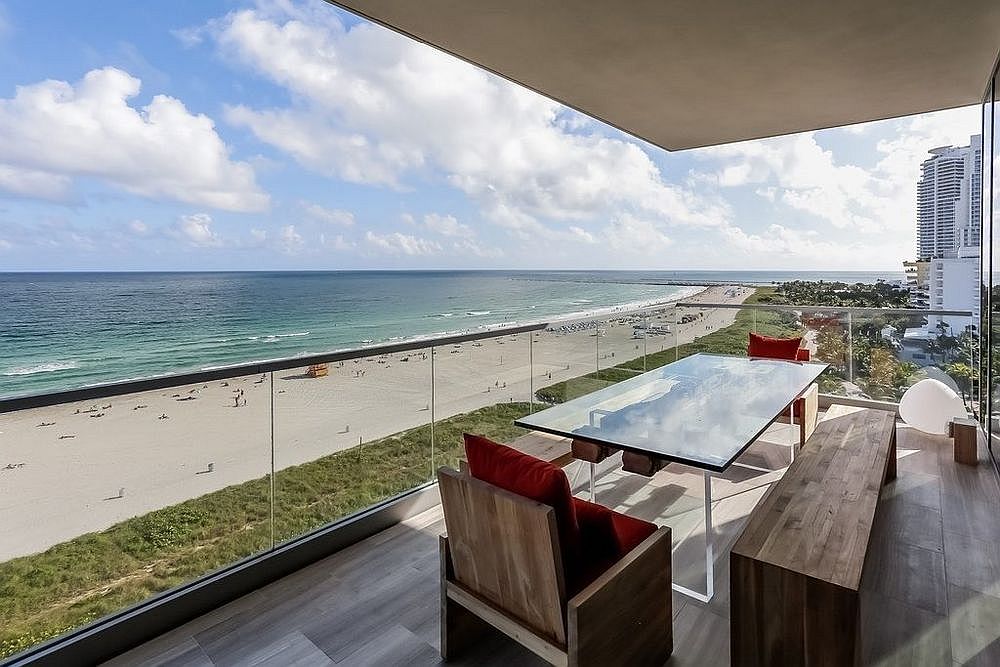 Private balcony of the penthouse overlooking the beach and the ocean