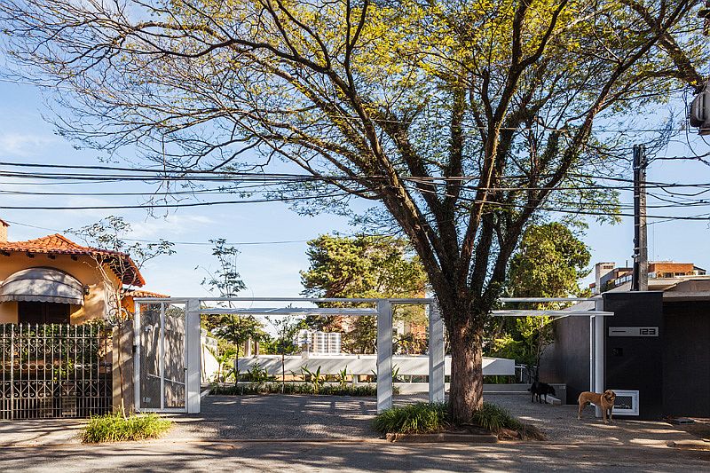 Private street facade of the gorgeous Sao Paulo home with an open, central courtyard