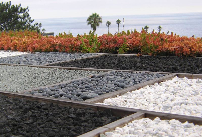 Red succulents unify a variety of gravel selections