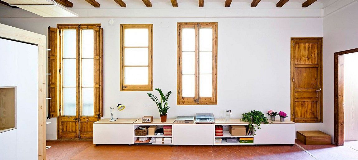 Refurbished living space of small, modern apartment in Barcelona