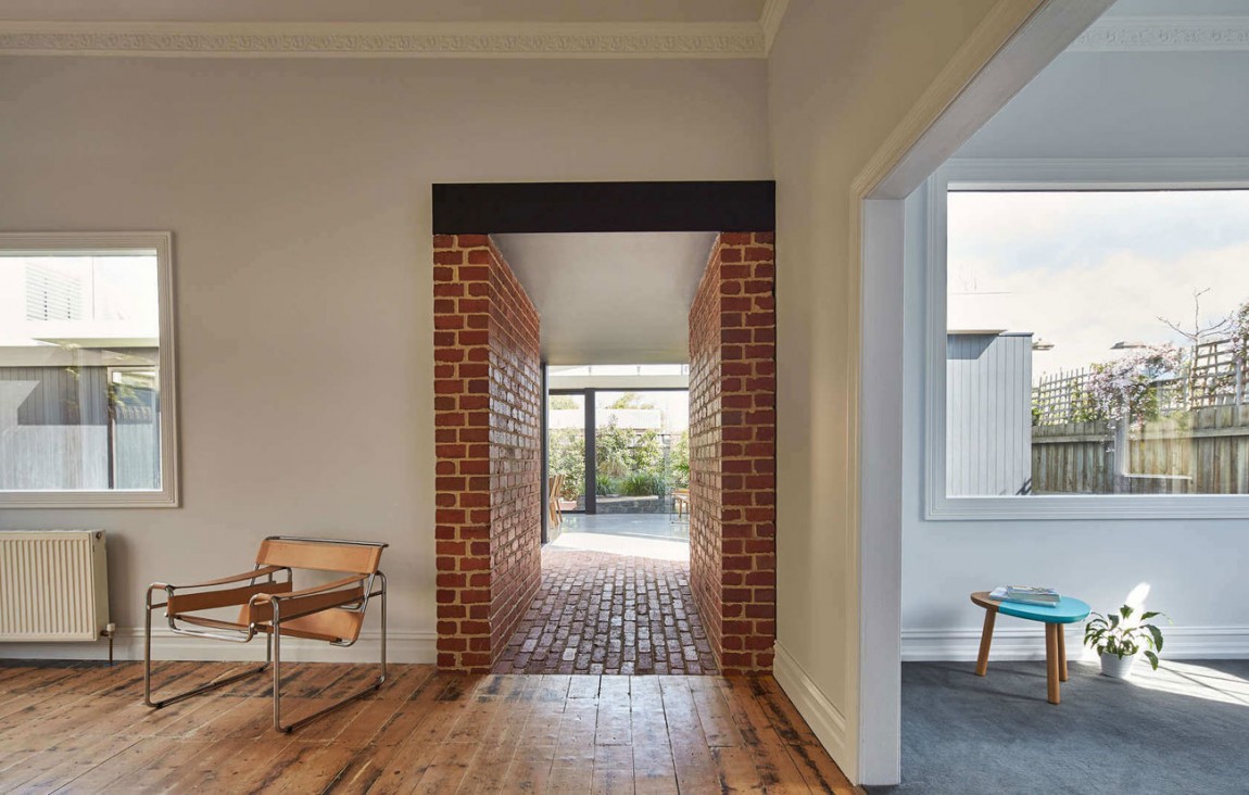 Salvaged brick used to create the tunnel that connects old and new structures inside the Hawthorn home