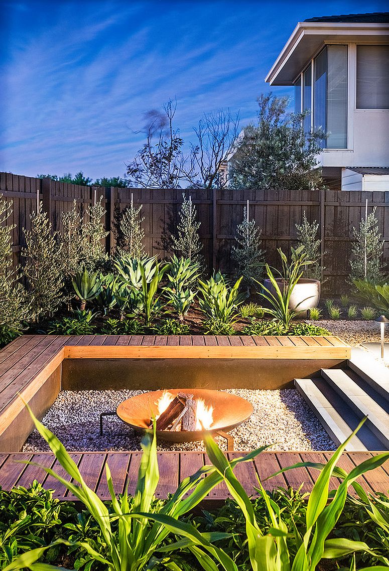 Simple bench-styled seating around the fire pit [Design: Bayon Gardens]
