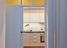Small-narrow-space-in-the-Poznan-apartment-turned-into-kitchen-and-dining-217x155