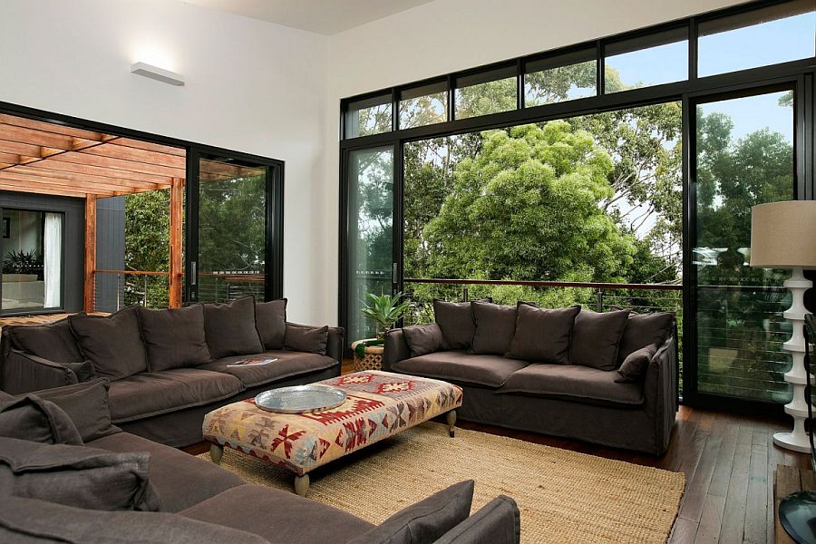 Spacious living area completely opens up to the bush outside