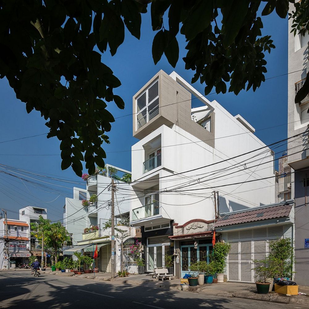 Street facade of narrow urban house in Ho Chi Minh city