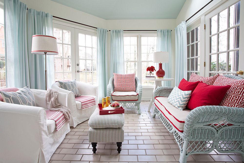 Stylish sunroom with modern beach style in white, blue and red [Design: Lindsey Hene Interiors]