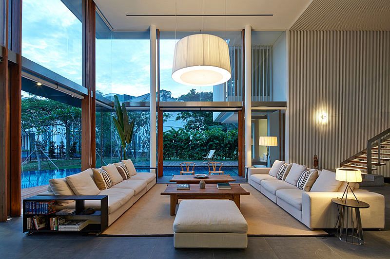 Swimming pool outside wraps itself around the spacious, open living room