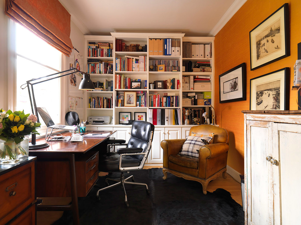 Timeless Lobby Chair by Charles and Ray Eames in the home office [Design: Mia Karlsson Interior Design]