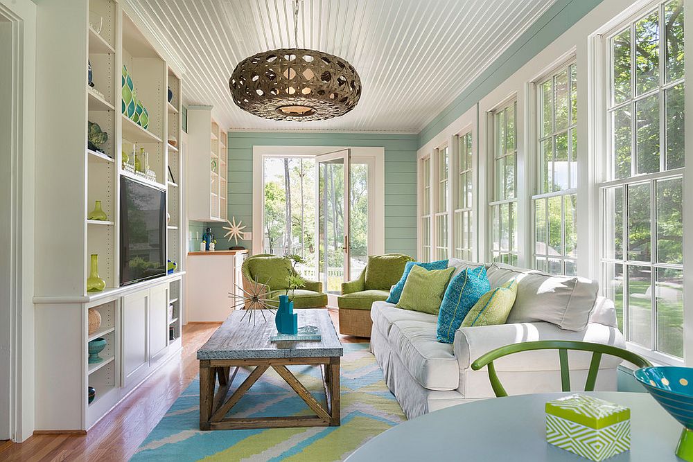 Turn the beach style sunroom into a year-long family hangout