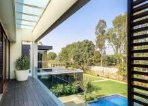 View-of-the-poolscape-and-backyard-from-deroom-balcony-217x155