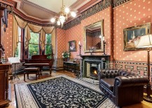 Wallpaper and rug bring plenty of pattern to the living room