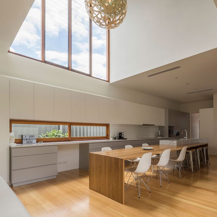 Window above the kitchen counter is a great aesthetic and functional addition