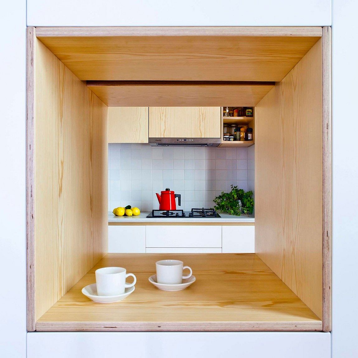 Window into the kitchen also serves as a cool serving station