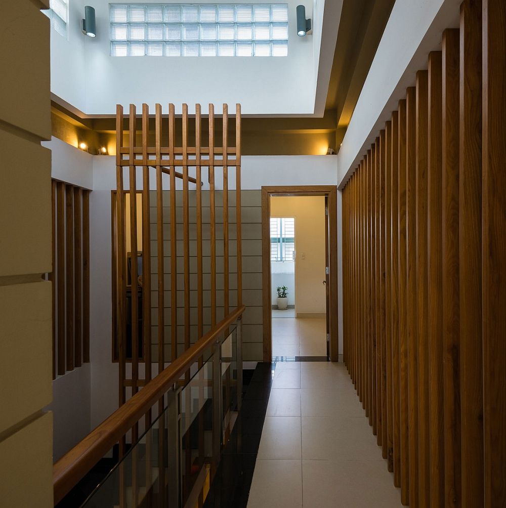 Wooden slats combine privacy and demarcation of space with smart flow if light