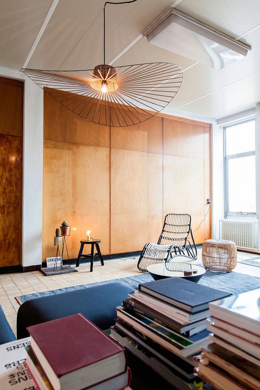 Wooden walls bring texture to the ligh-filled living space