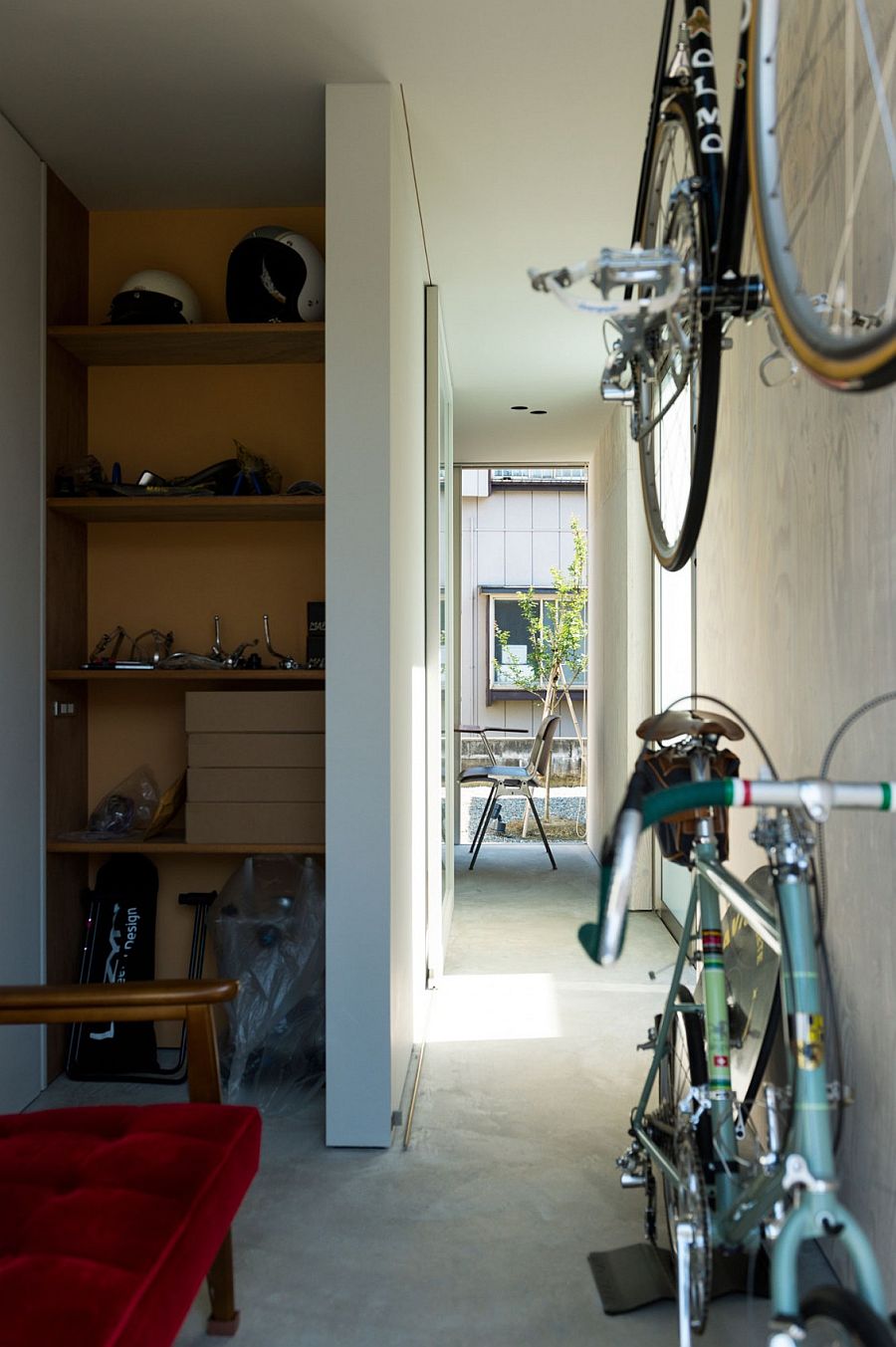 Bicycles and bikes become a decorative part of interior at the Go Bang! House