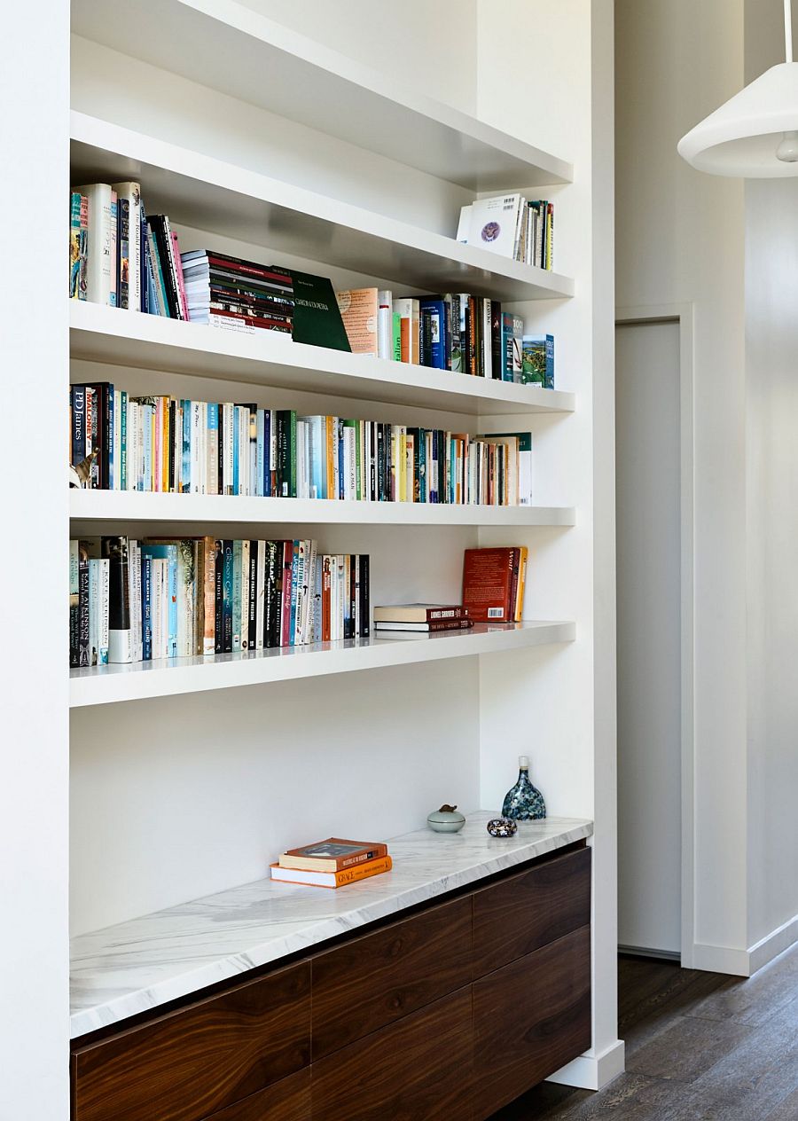 Book collection adds color to the neutral interior