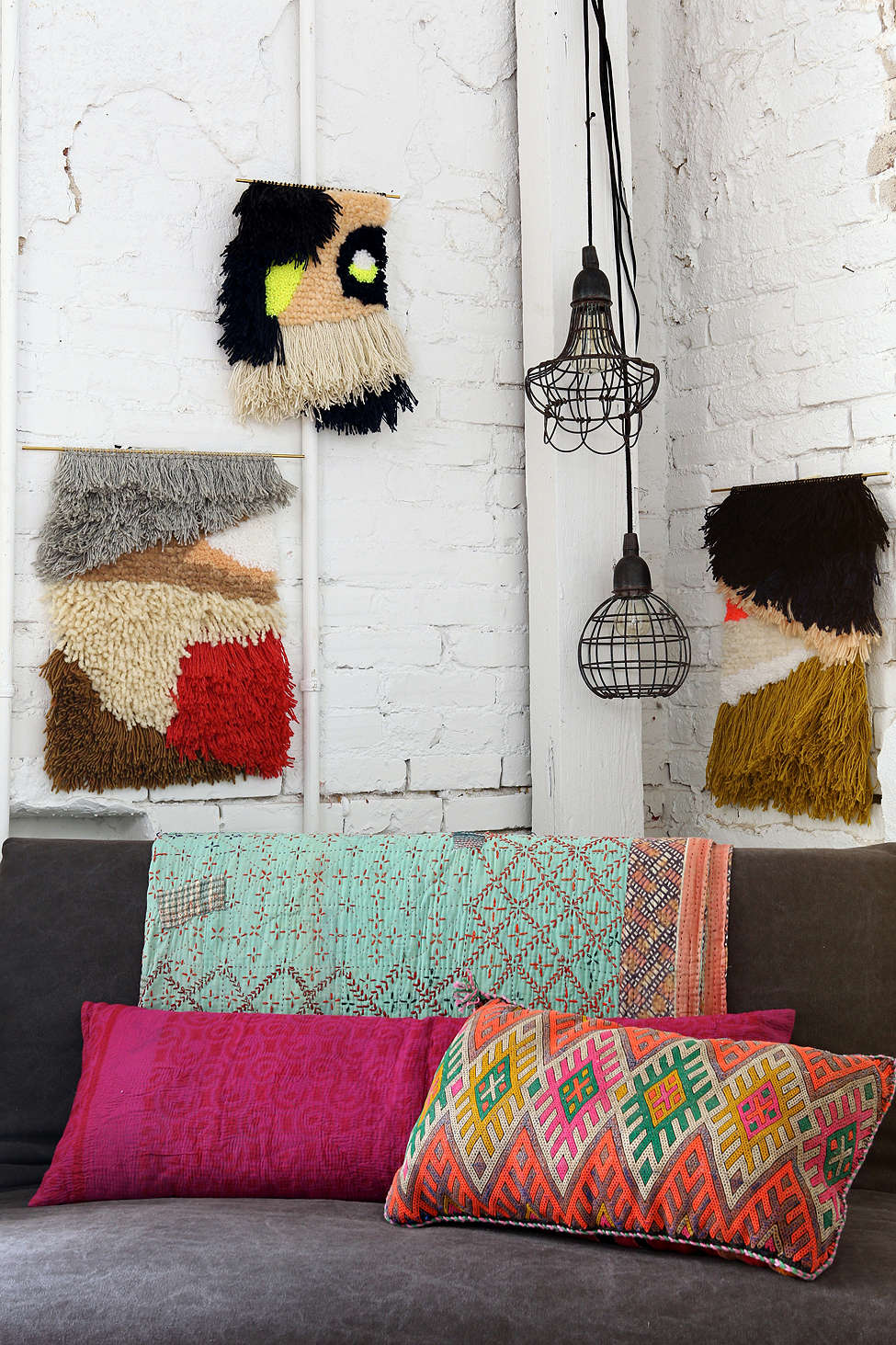 Collection of colorful wall hangings from Urban Outfitters