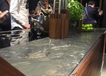 Fabulous-kitchen-island-with-stone-worktop-and-wooden-shelves-Team7-at-EuroCucina-217x155