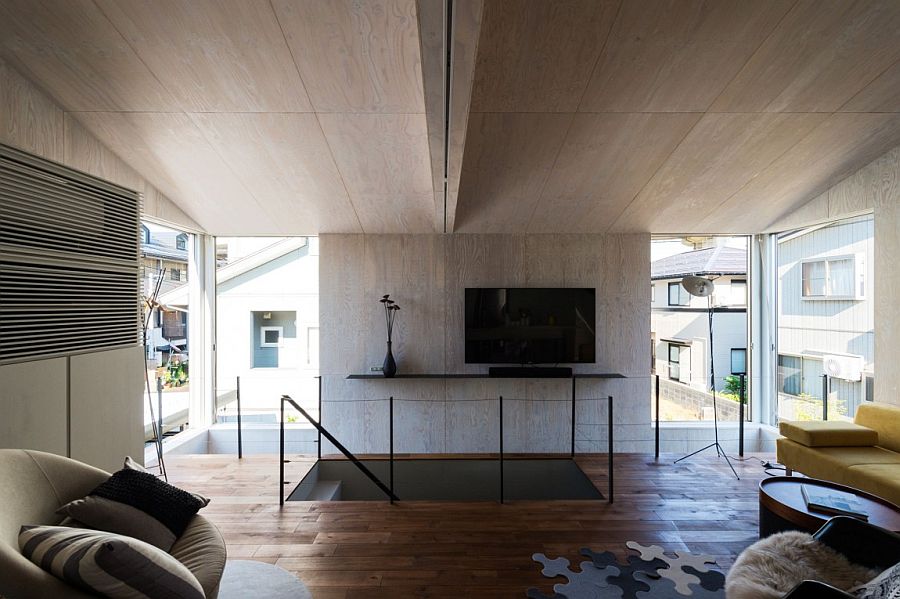 Large windows bring in natural light into the top level of the house