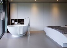Minimal-master-bedroom-in-white-with-bathtub-217x155