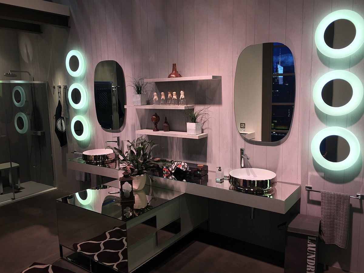 Mirror finishes and metallic sinks give inda bathrooms a dazzling aura