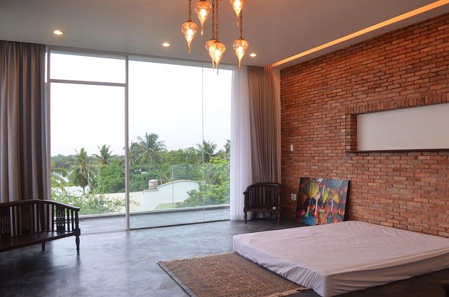 Modern minimal bedroom with accent brick wall