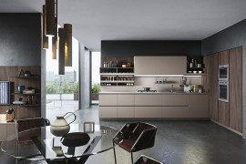 Oak and brown finishes create a classy moern kitchen