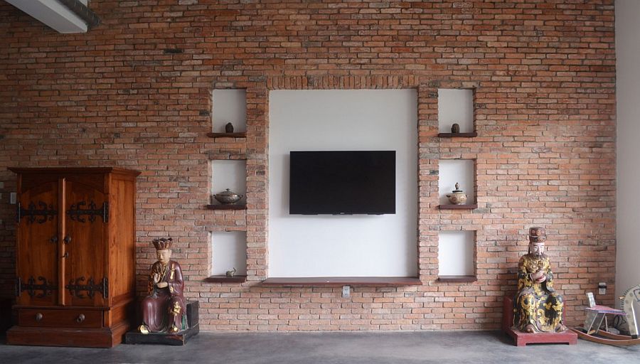 Old brick walls give the interior a classic, rustic appeal