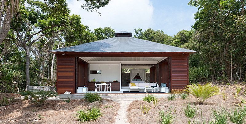 Small Tropical Style Beach House Opens Up To The World Outside