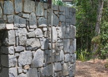 Outdoor-shower-area-with-stone-wall-217x155